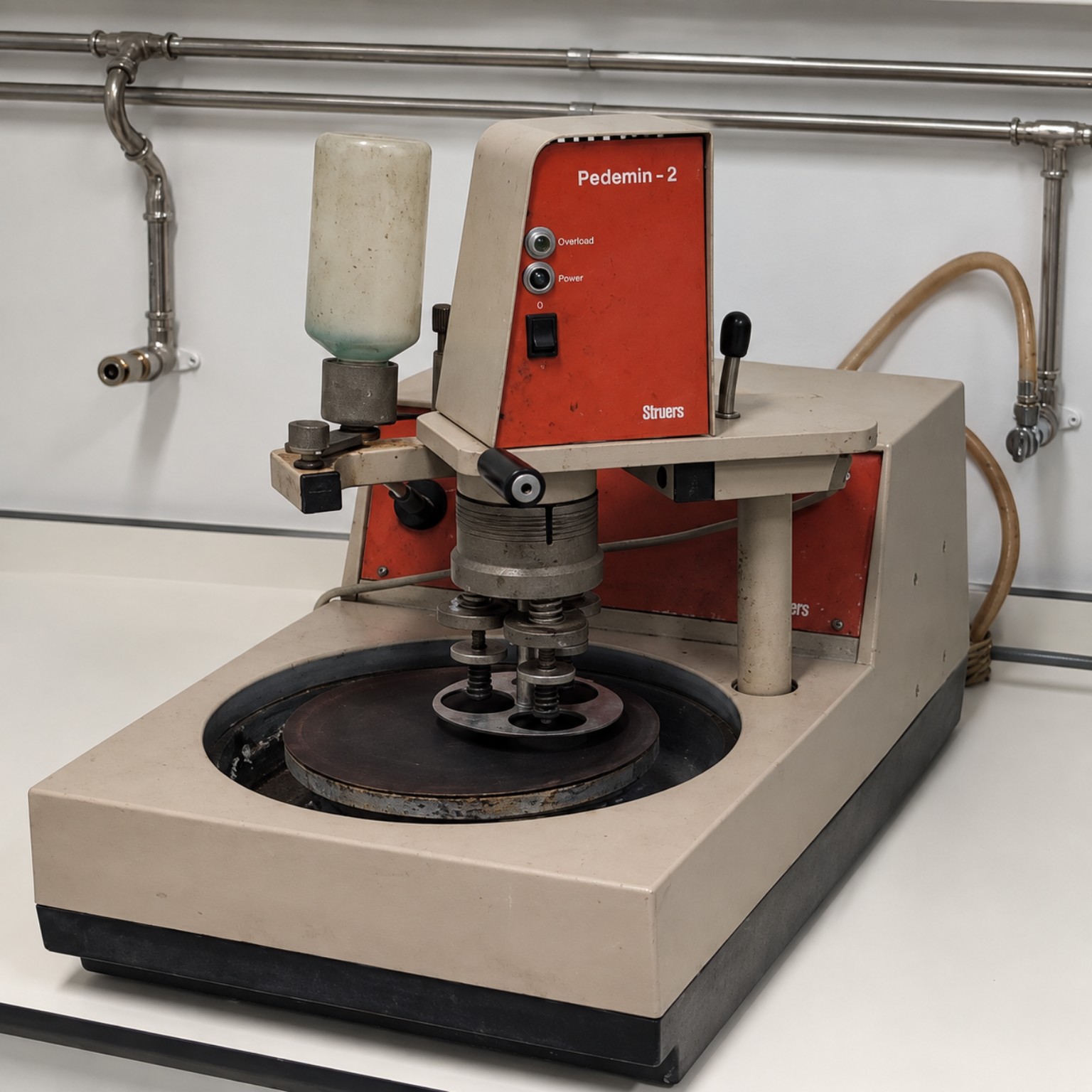 Sistema de desbaste y pulido con cabezal automático Struers Pedemin 2